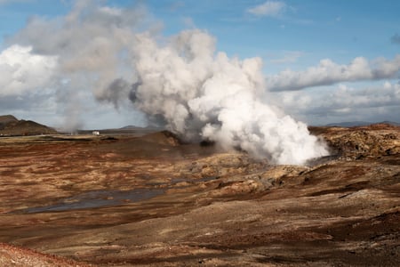 The powerful hot spring of Gunnuhver smoking strongly during our Reykjanes Tour