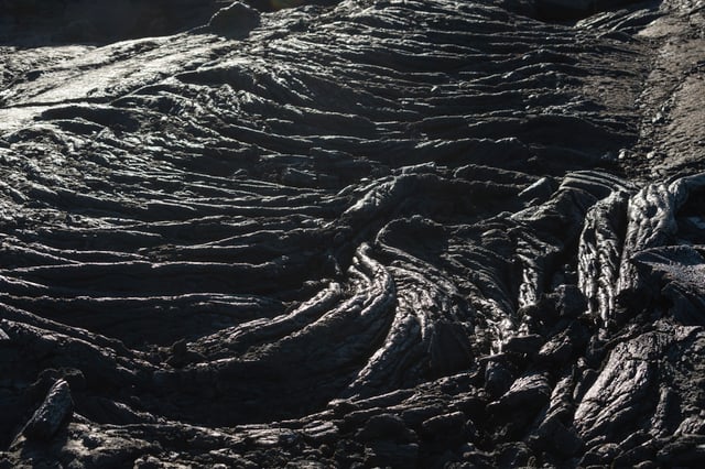 Steaming black rock following volcanic eruptions in Iceland