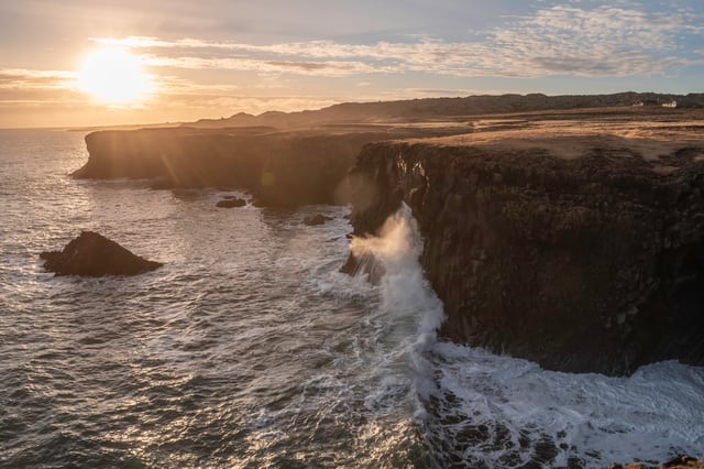The cliffs of Arnarstapi photographed at sunset